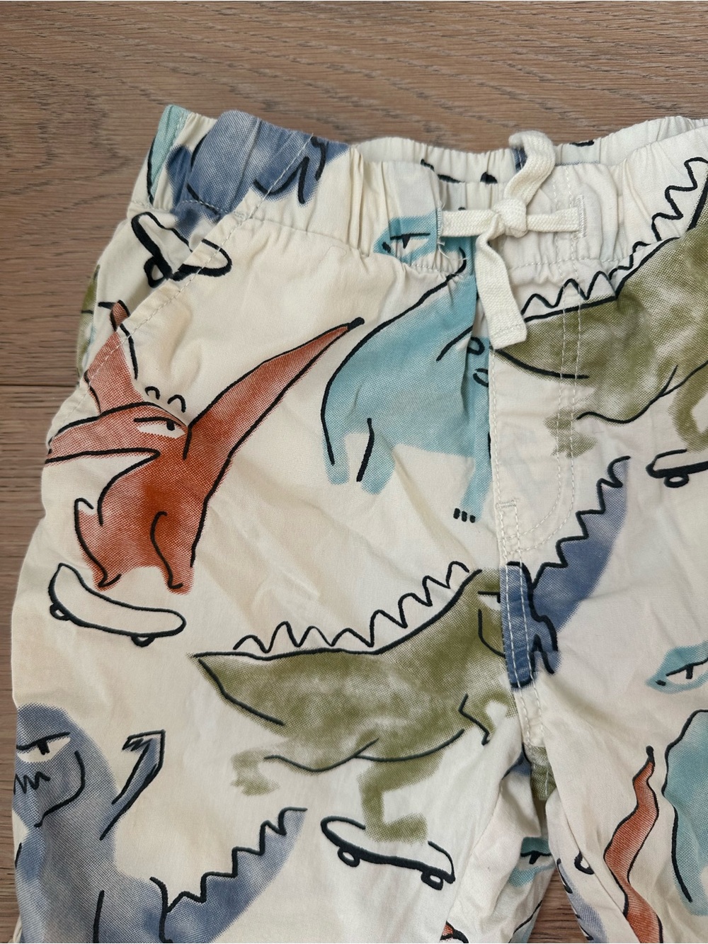 H&M Elastic Waist Shorts Cream Dino Print with Blue, Green & Orange Accents 4-5T - Picture 2 of 5
